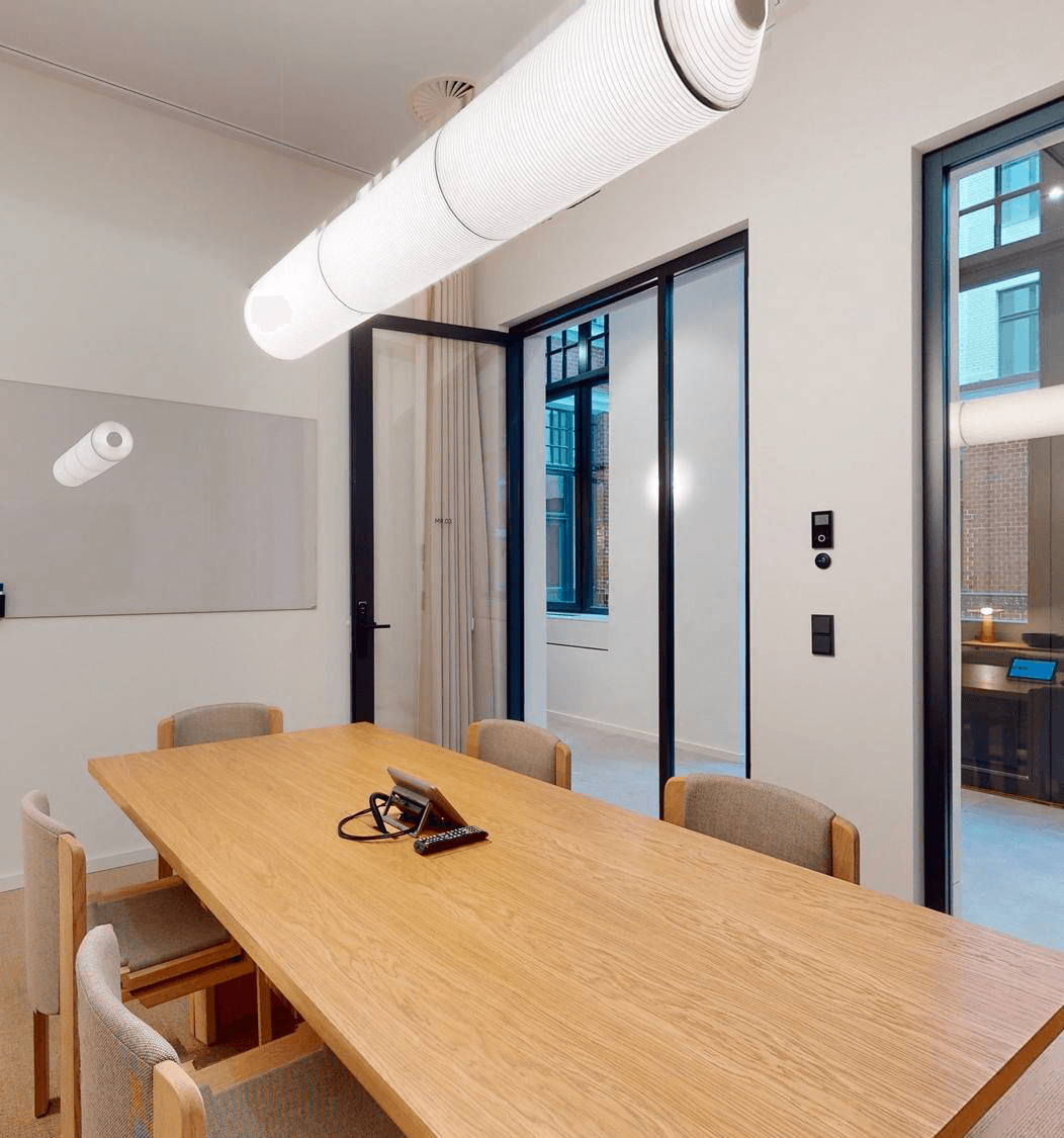 6-Person Meeting Room at Fora - Linden Palais with HD AV & Natural Light