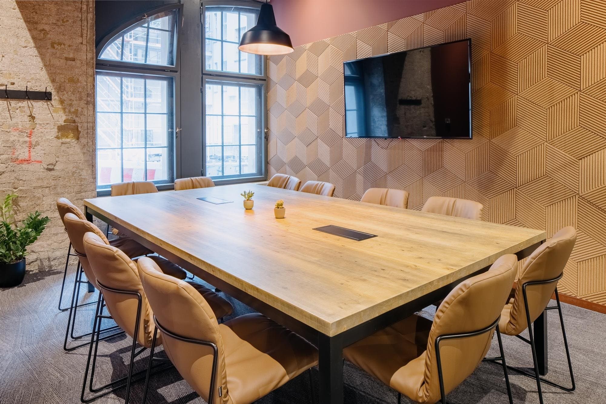 Chic beige oasis: a blend of modern patterns and rustic charm at Techspace Eiswerk