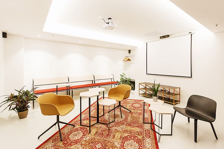 Colorful Apollo-Soyuz meeting space for creative endeavors at SPACE SHACK Coworking