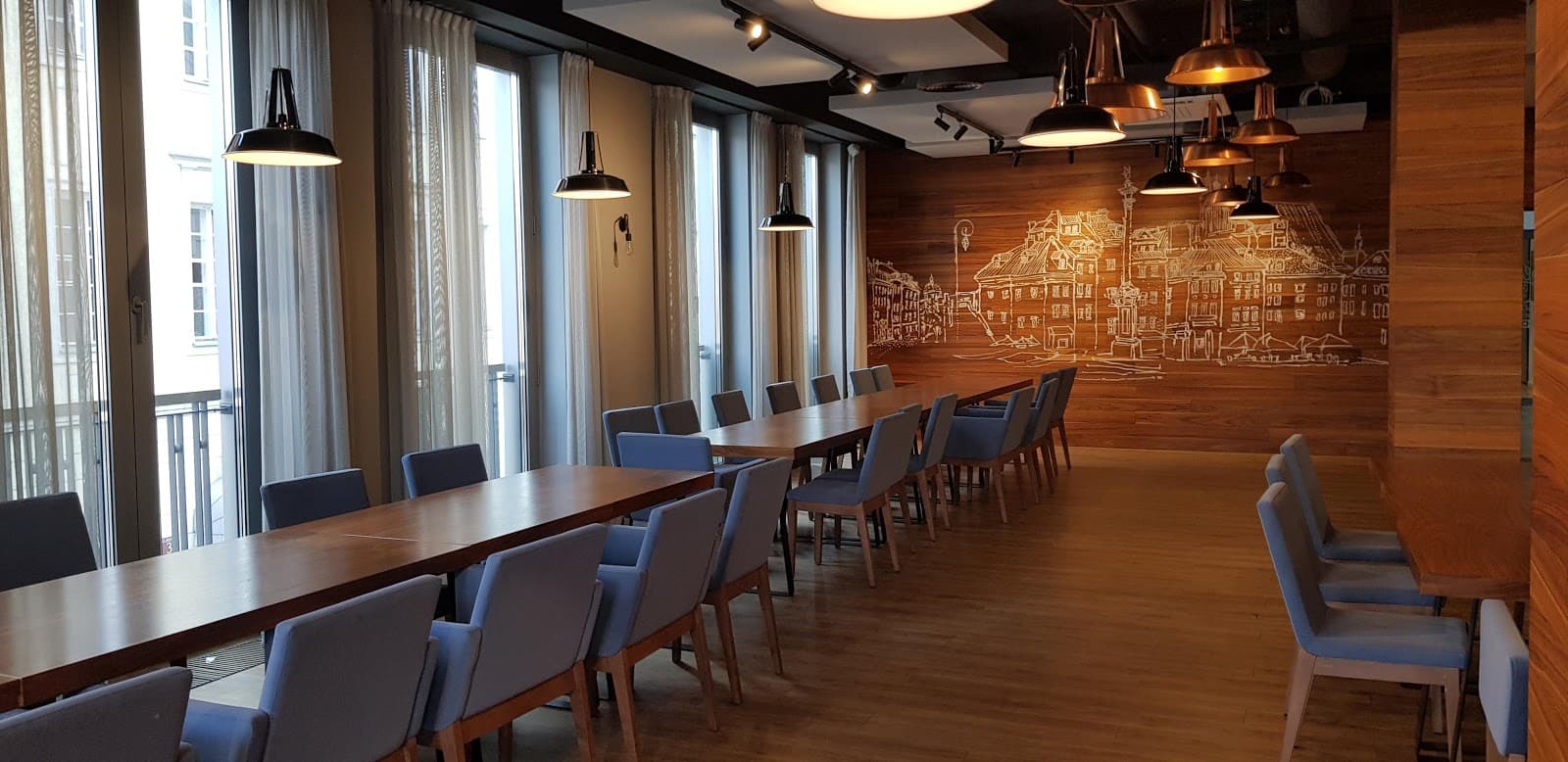 Flexible Day Pass at WORKIN Senatorska with Ergonomic Furniture interior photo 10
