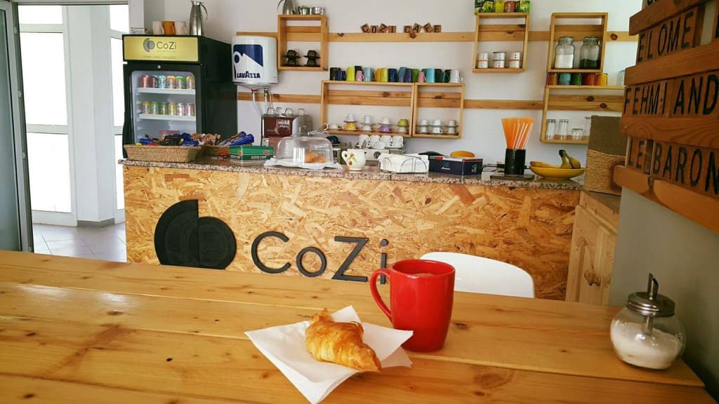 CoZi Coworking Café Day Pass - Flexible Workspace & Networking in Houmt Souk interior photo 1