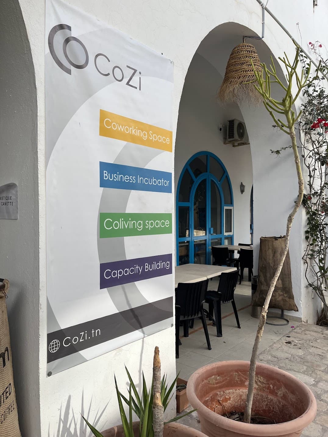 CoZi Coworking Café Day Pass - Flexible Workspace & Networking in Houmt Souk interior photo 10