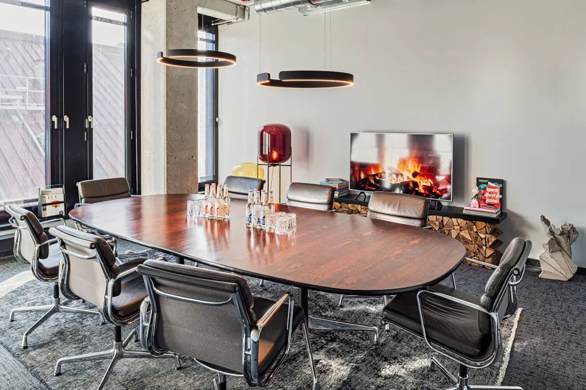 Fireside Room — 6-Person Hourly Meeting at Design Offices Eschborn €69/hr interior photo 1