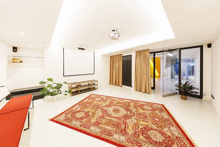 Colorful Apollo-Soyuz meeting space for creative endeavors at SPACE SHACK Coworking interior photo 4