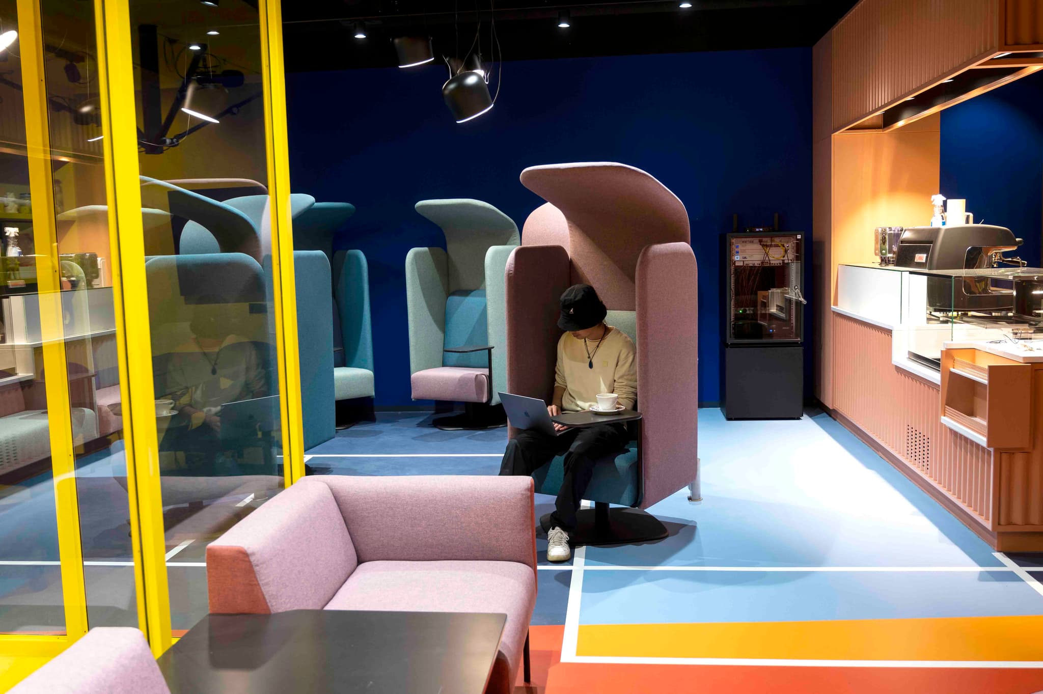 Vibrant and colorful workspace oasis at Berlin Brandenburg Airport interior photo 3